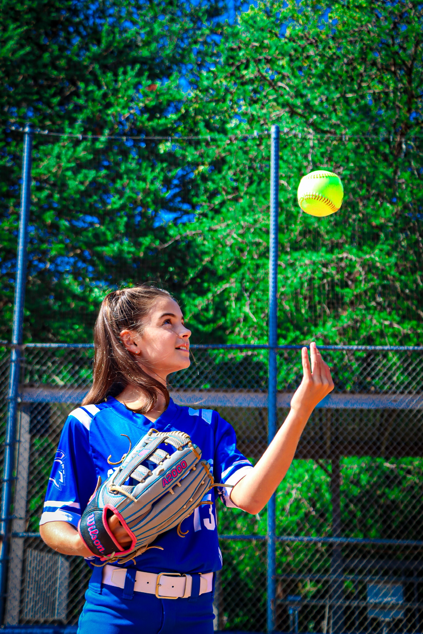 Asher playing softball